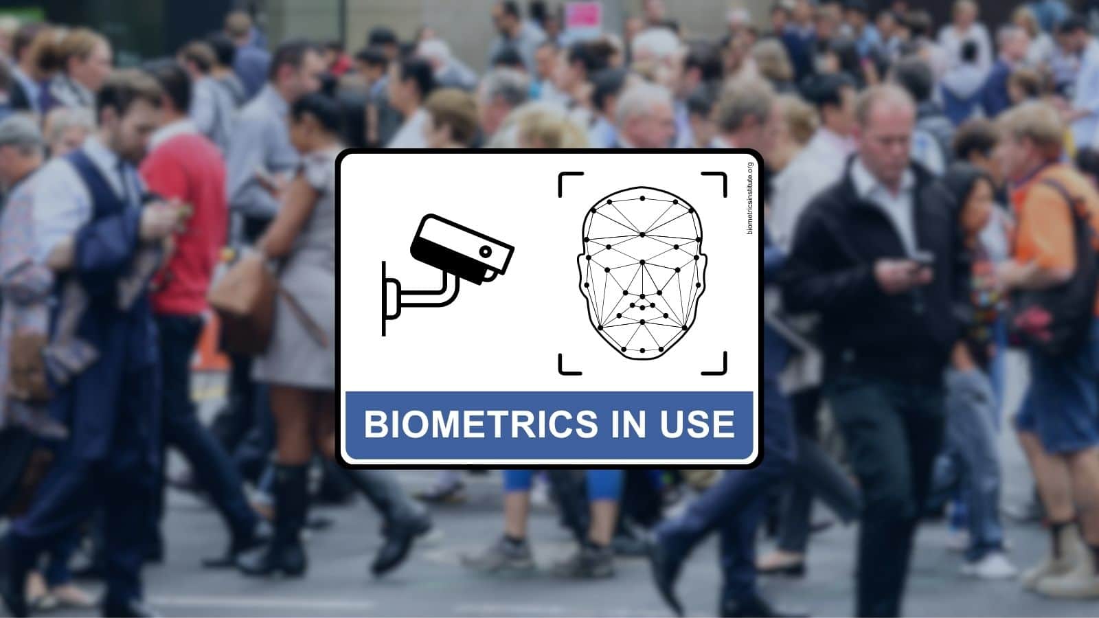 Signage emphasising that CCTV biometric facial recognition is in use in a public street setting